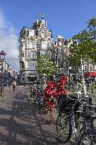 Amsterdam, center of the city, bikes, bicycles, parking, people, tourist, tourists, tourism