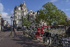 Amsterdam, center of the city, bikes, bicycles, parking, people, tourist, tourists, tourism