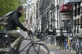 Amsterdam, center of the city, bikes, bicycles, parking, people, tourist, tourists, tourism