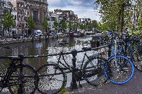 Amsterdam, center of the city, bikes, bicycles, parking, people, tourist, tourists, tourism