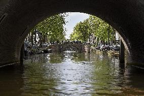 Amsterdam, center of the city, bikes, bicycles, parking, people, tourist, tourists, tourism