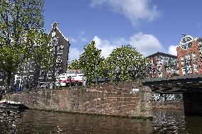 Amsterdam, center of the city, bikes, bicycles, parking, people, tourist, tourists, tourism