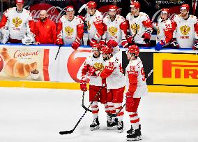 Russian players celebrate Nikita Kucherov's goal