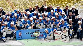 Hockey players of Finland celebrate a victory, gold medal