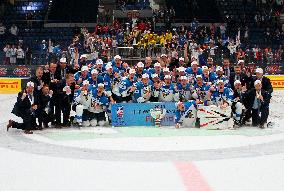 Hockey players of Finland celebrate a victory, gold medal