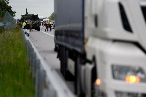 Lorry collides with military vehicle, U.S. convoy