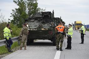 Lorry collides with military vehicle, U.S. convoy