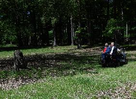 Milos Zeman, Andrej Kiska, the Lany game reserve, forest, bodyguard