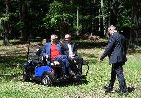 Milos Zeman, Andrej Kiska, the Lany game reserve, forest, bodyguard