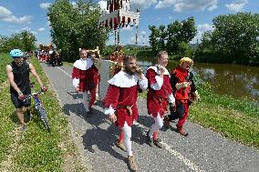 two-day historic royal procession of emperor Charles IV and his suite with crown jewels