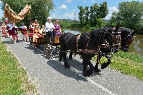 two-day historic royal procession of emperor Charles IV and his suite with crown jewels