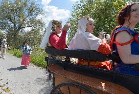 two-day historic royal procession of emperor Charles IV and his suite with crown jewels