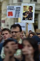 People hold a  placard No, better grants during a demonstration in Brno