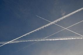 Lines from aircraft in the sky, traffic, overflight, contrail, contrails