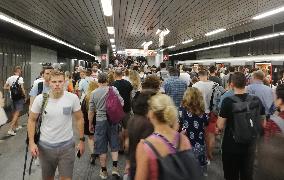 Prazskeho povstani metro station, rush hour, commuting