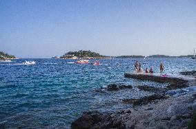 Hvar, promenade, swimming, tourists