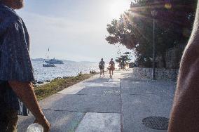 Hvar, promenade, swimming, tourists