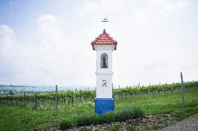 Blatnicka vineyard, wine, wayside shrine of Saint Urban, landscape, sky, clouds