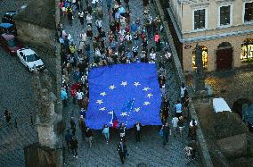 March to Hradcanske Square, demonstration, Million Moments for Democracy, Charles Bridge, EU flag