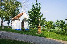 Stara Hora and Kojiny at Vlcnov, traditional wine cellars, village chapel