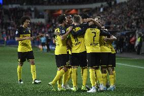 Borussia Dortmundｴs players celebrate their first goal