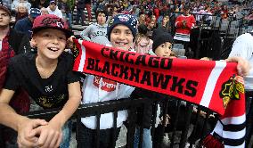 training session of NHL's team Chicago Blackhawks, ice hockey fans