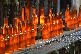 Production of glass bottles, company O-I