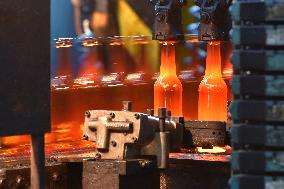 Production of glass bottles, company O-I