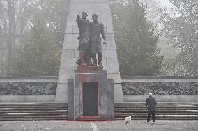 Red Army monument splashed with red colour