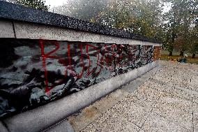 Red Army monument splashed with red colour