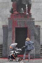 Red Army monument splashed with red colour