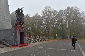 Red Army monument splashed with red colour