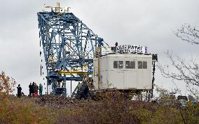 activists block coal mine excavator in protest of mine sale