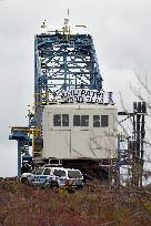 activists block coal mine excavator in protest of mine sale