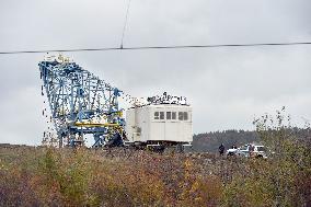 activists block coal mine excavator in protest of mine sale