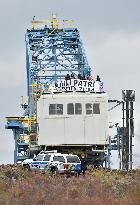 activists block coal mine excavator in protest of mine sale