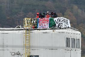 activists block coal mine excavator in protest of mine sale