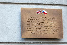 a plaque in memory of the Czech-British cooperation in secret home seminars