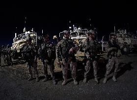 Bagram allied base, soldiers, Mine-Resistant Ambush Protected (MRAP), military light tactical vehicle