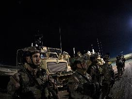 Bagram allied base, soldiers, Mine-Resistant Ambush Protected (MRAP), military light tactical vehicle