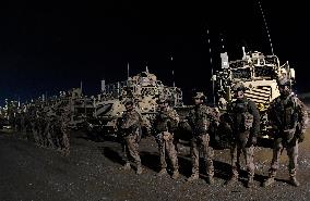 Bagram allied base, soldiers, Mine-Resistant Ambush Protected (MRAP), military light tactical vehicle