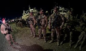 Bagram allied base, soldiers, Mine-Resistant Ambush Protected (MRAP), military light tactical vehicle