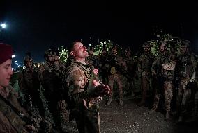 Bagram allied base, Mine-Resistant Ambush Protected (MRAP), military light tactical vehicle, soldiers