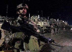 Bagram allied base, Mine-Resistant Ambush Protected (MRAP), military light tactical vehicle, soldiers, soldier