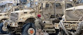 Bagram allied base, Mine-Resistant Ambush Protected (MRAP), military light tactical vehicle, soldier