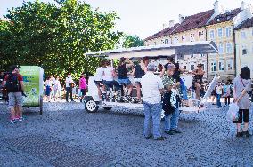 beer bike, car, tourists, Old Town Square