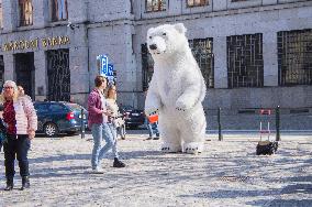 Na Prikope Street, tourists, dancing giant inflatable polar bear mask