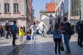 Wenceslas Square, tourists, giant inflatable polar bear mask