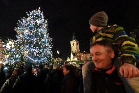 Christmas market and tree at Old Town Square in Prague, Church of Our Lady before Tyn