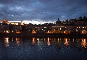 Greenpeace activists project message for CzechPM on government building in Prague